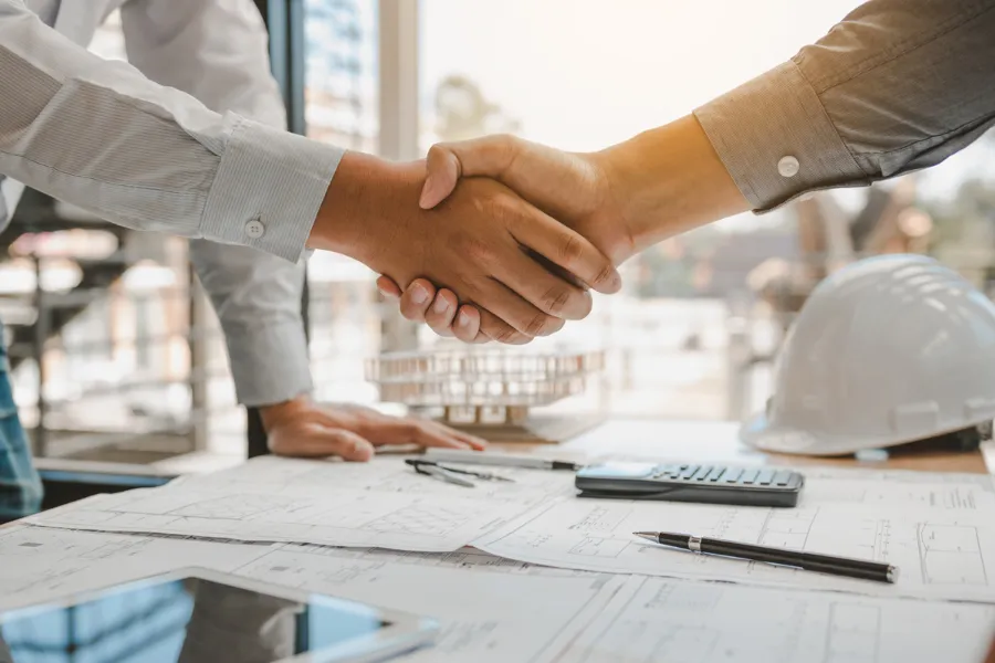 real estate contacting between two people